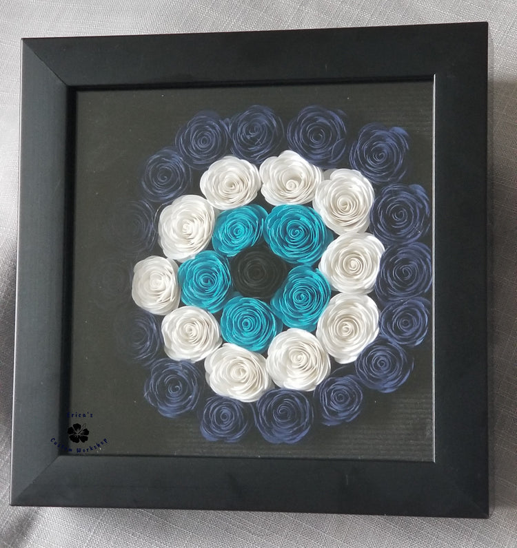 Rolled paper flowers in evil eye design