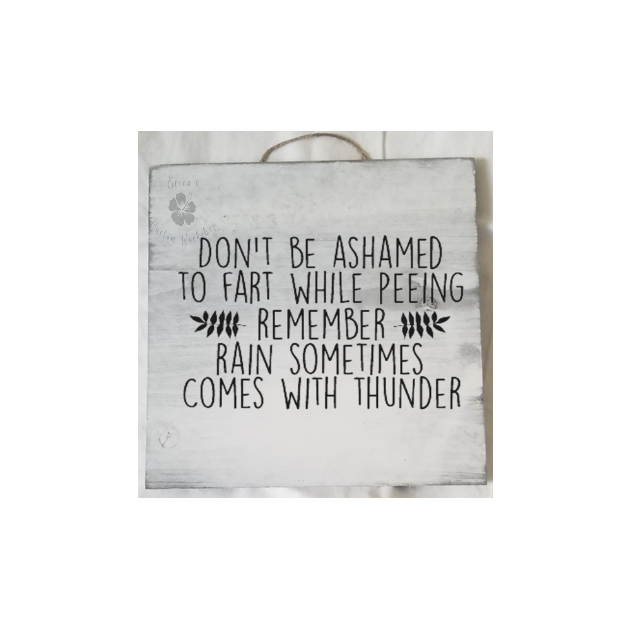 Whitewashed wooden sign